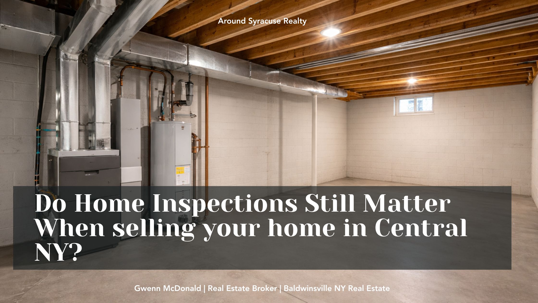 Clean unfinished basement with newer furnace and water heater showing home inspection condition in Central New York