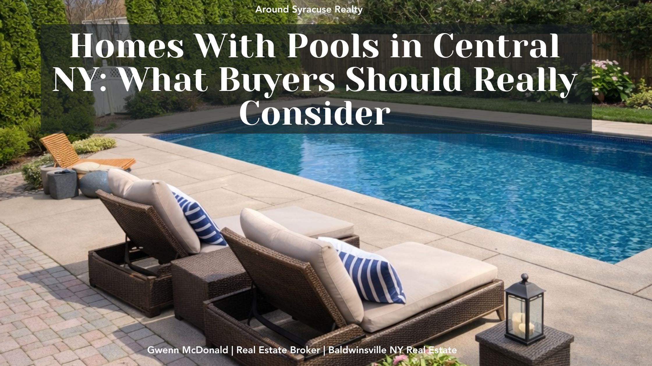 Backyard with inground pool, patio pavers, lounge chairs, and landscaped privacy fence in a Central New York suburban home.