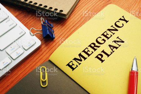 Emergency Plan Or Disaster Preparedness On The Desk.